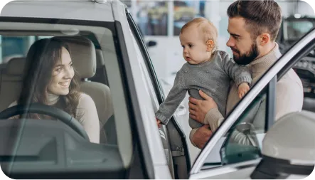 Person driving a new car after getting an auto loan approval