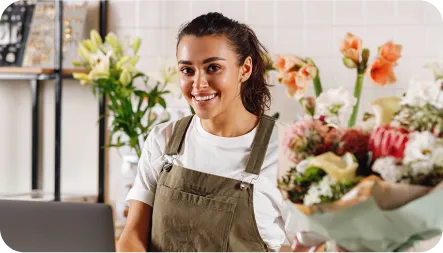 Small business owner in a flower shop applying for a business loan